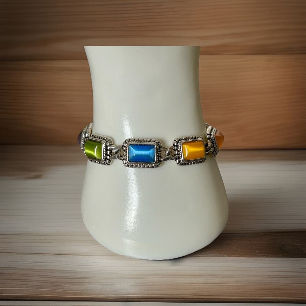 Cute Premier Designs Silver Tone Lollipop Moon glow Bracelet .